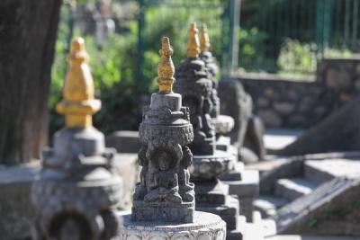 Serenity in Stone: Enhancing Your Garden with a Peaceful Sitting Buddha Statue